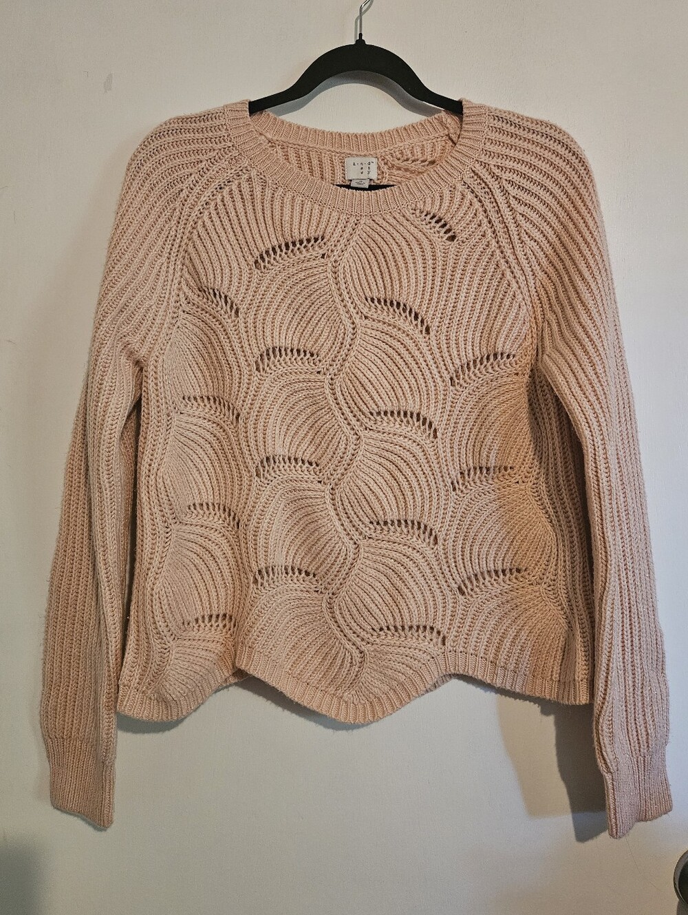 A New Day women’s pink open-knit sweater in size Medium.
